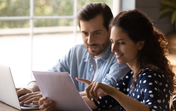 a couple reviewing paperwork
