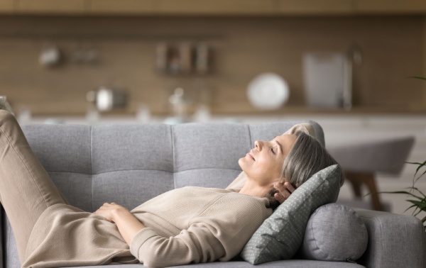 A woman relaxing on the sofa
