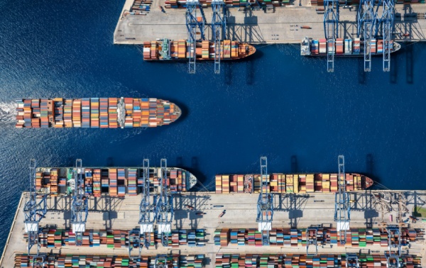 An aerial view of a cargo ship harbour.