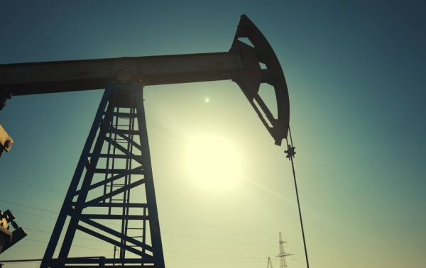 A silhouette of an oil pump.