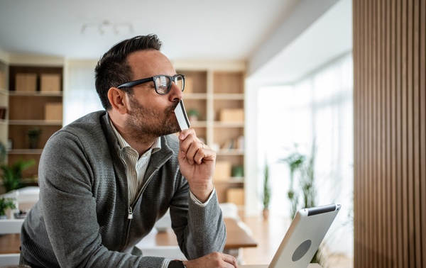 A man deciding what to buy online